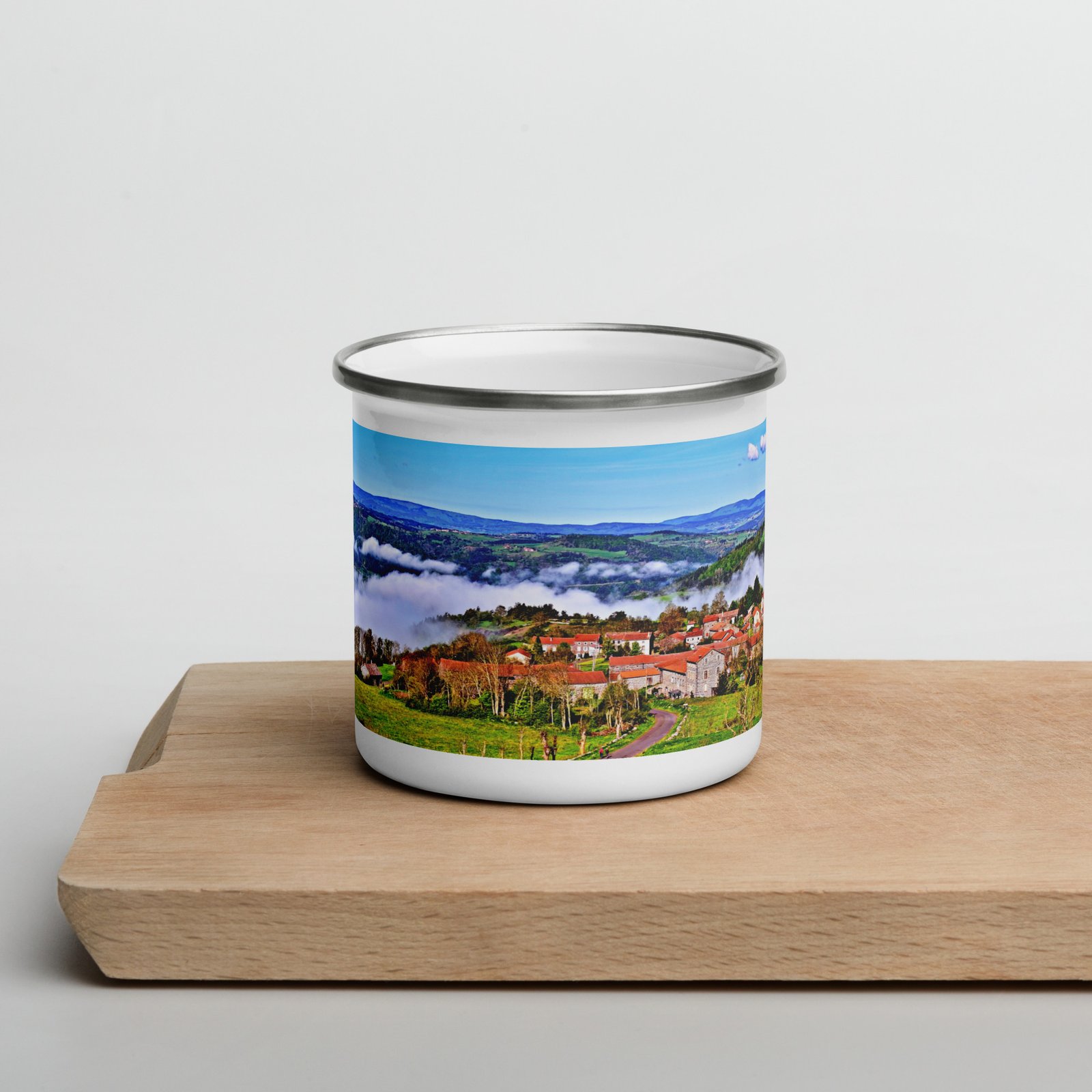 mug émaillé saint didier d 'allier, village suspendu aux nuages mug émaillé saint didier d 'allier, village suspendu aux nuages